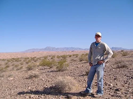Danny standing in desert